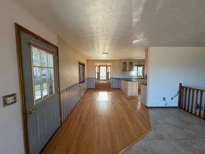 Before &mdash; Dining and kitchen — flooring, paint and lighting