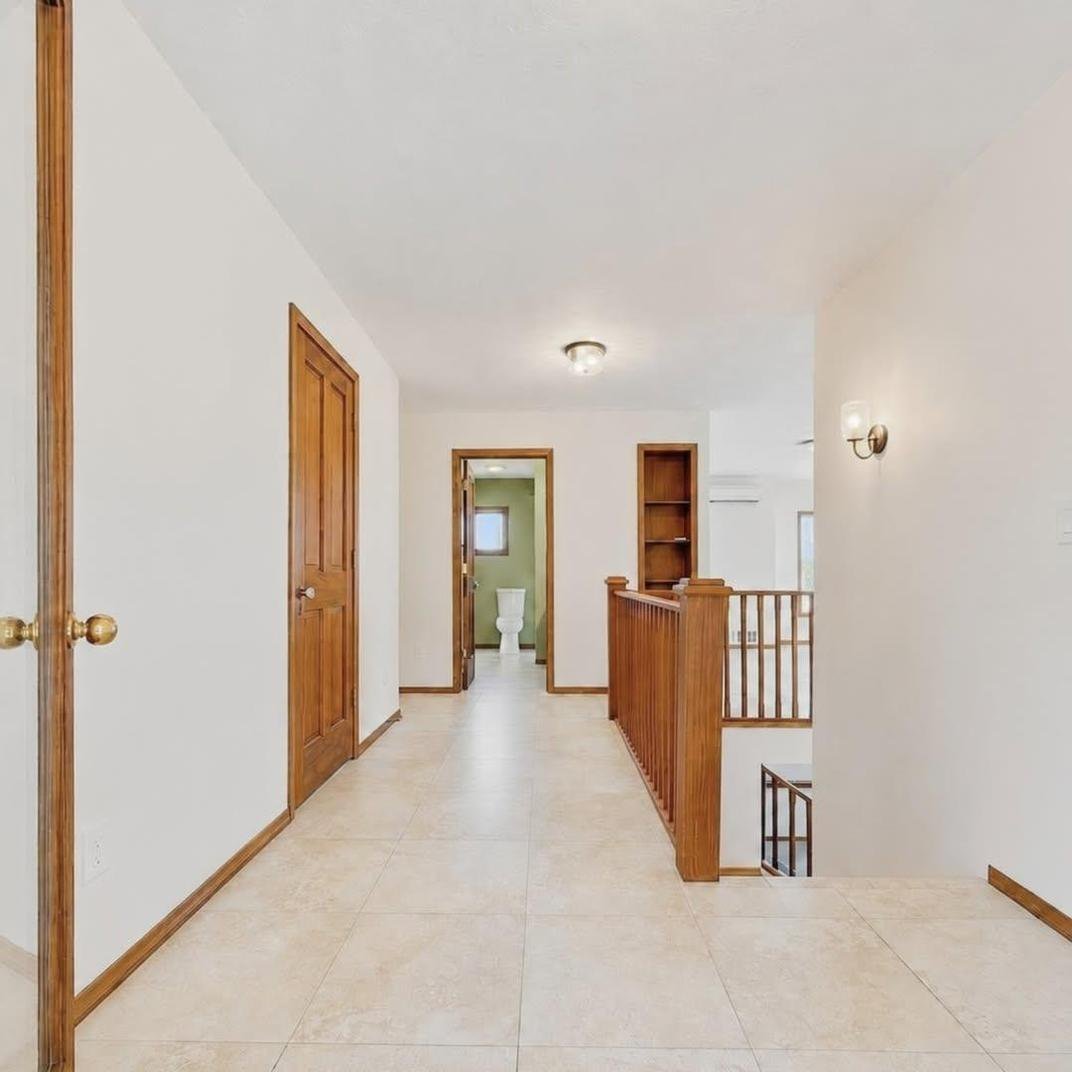 Open entry and hallway freshly painted during a pre-listing refresh