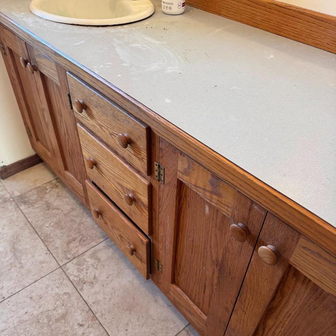 Original oak cabinetry and tile before update