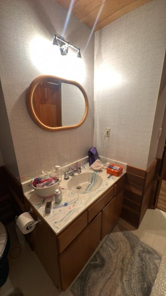 Original vanity and mirror before remodel